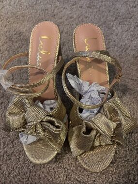 Lulu’s Gold Bow Ankle-Strap Women's Sandals